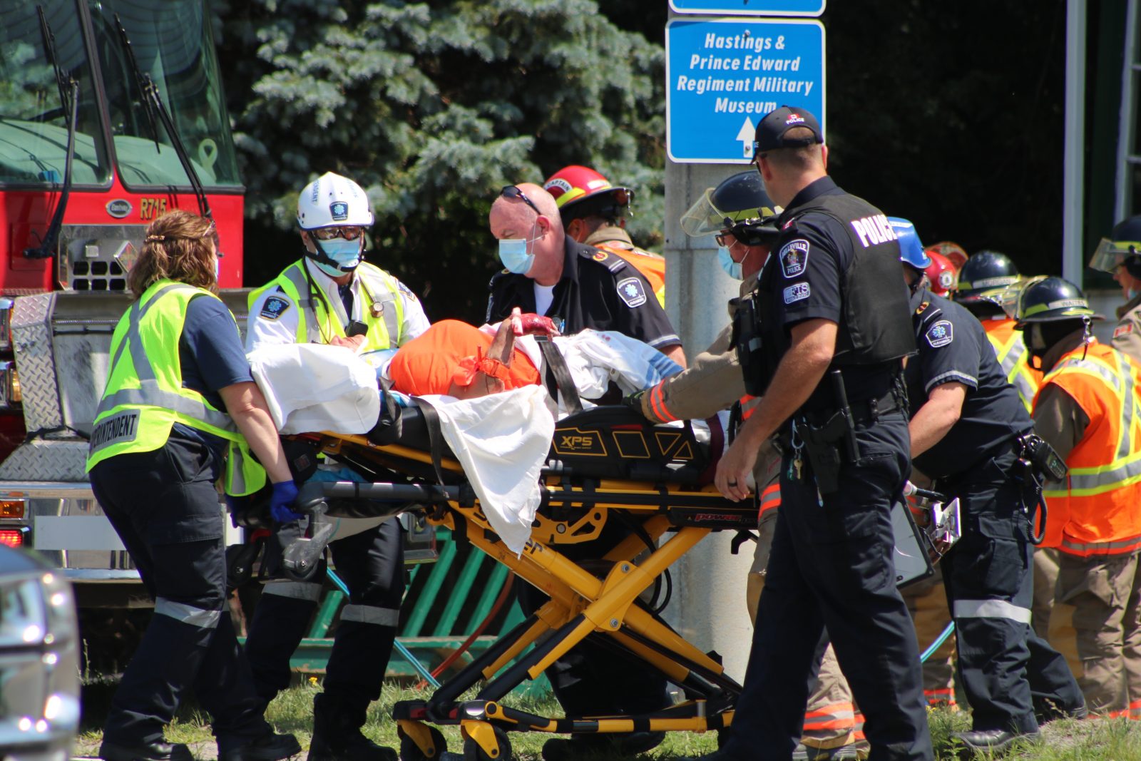 Road open after car collides with home, two people taken to hospital